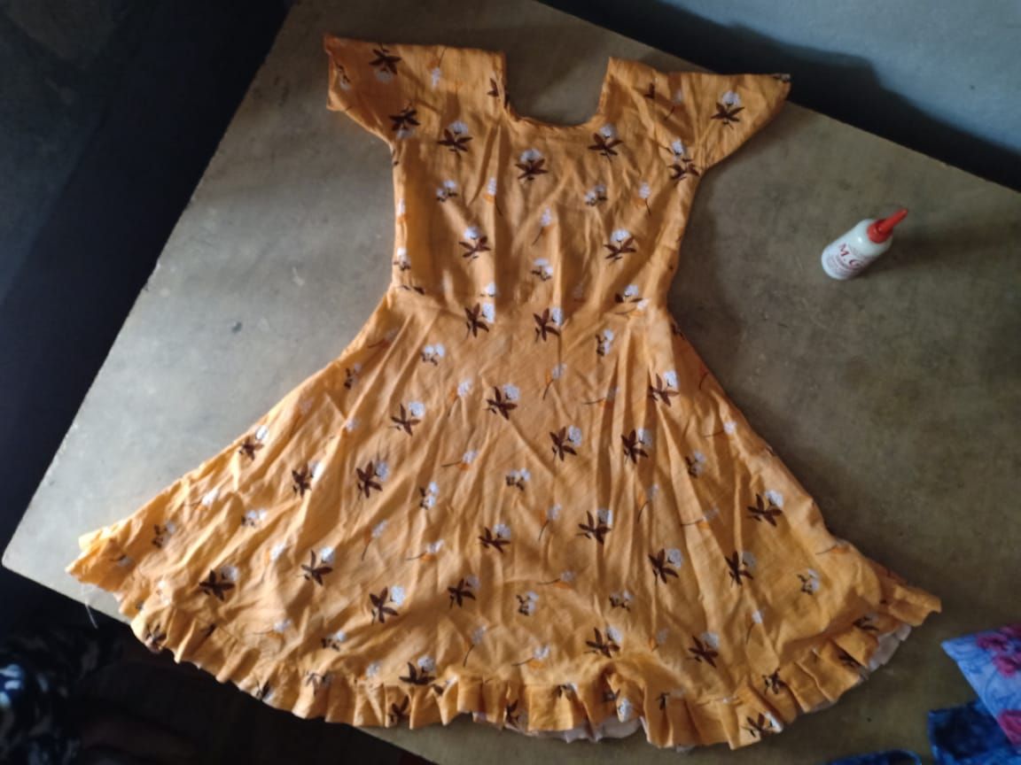 Dresses stitched by students at the tailoring center