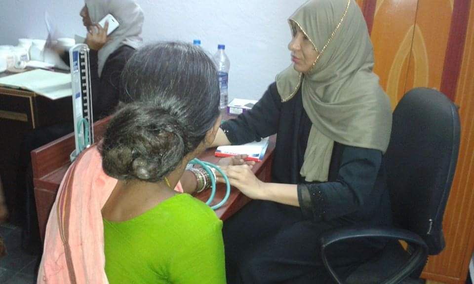 Doctor and patients at the Free Health Clinic