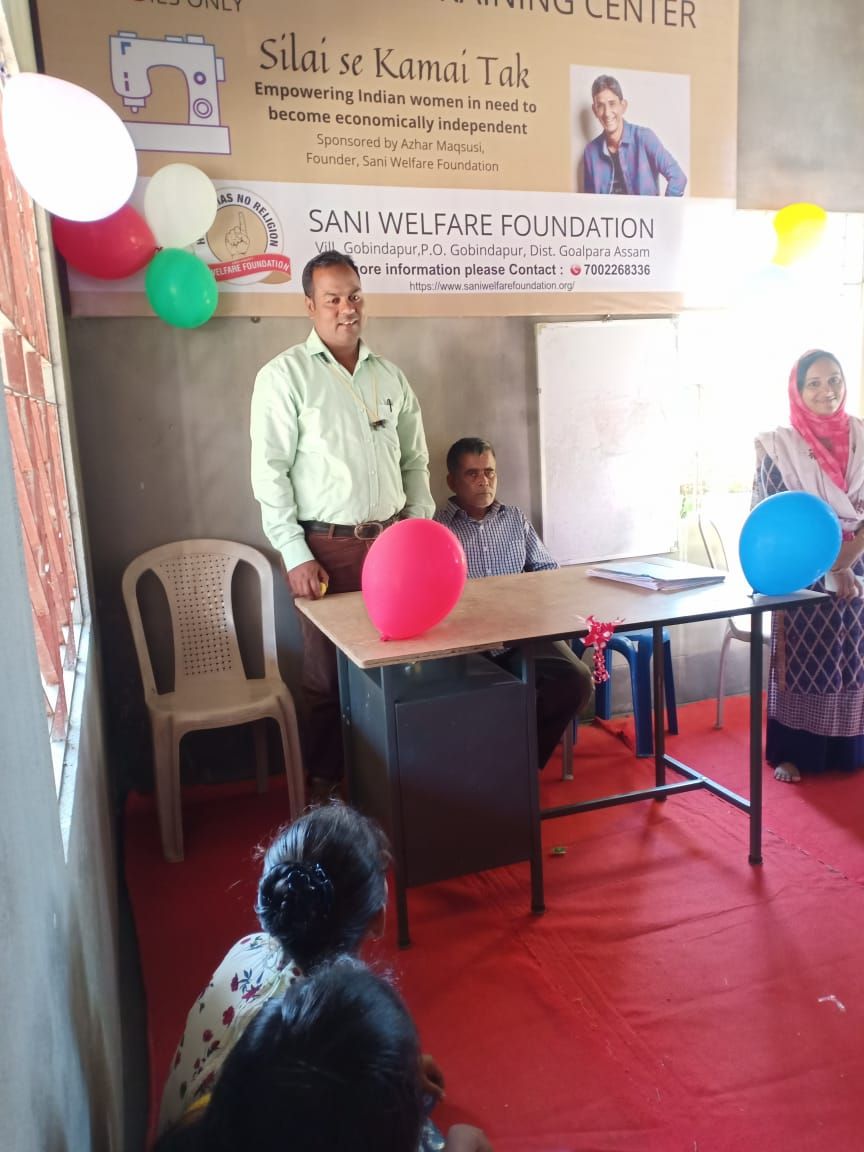 Women participating in free tailoring training